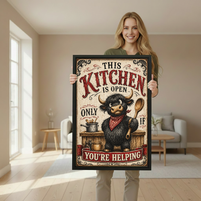Woman holding framed rustic highland cow kitchen canvas wall art in a softly lit living room.