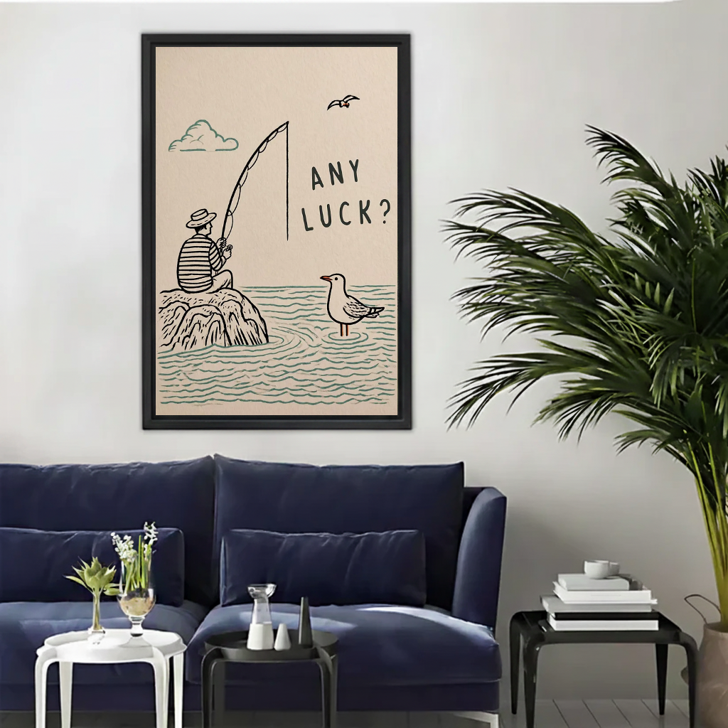 Minimalist fishing humor canvas wall art above a navy sofa beside a tall indoor palm.