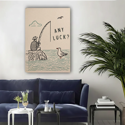 Unframed minimalist fishing humor canvas wall art above a navy sofa in a bright living room.