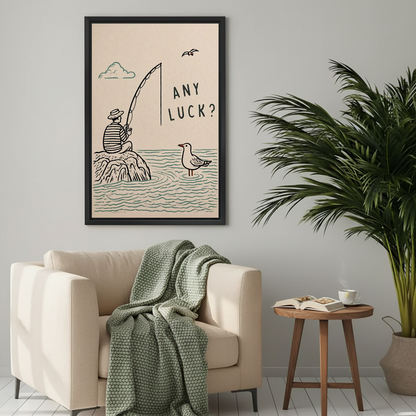 Minimalist fishing humor canvas wall art above a cream armchair with a green knitted blanket.