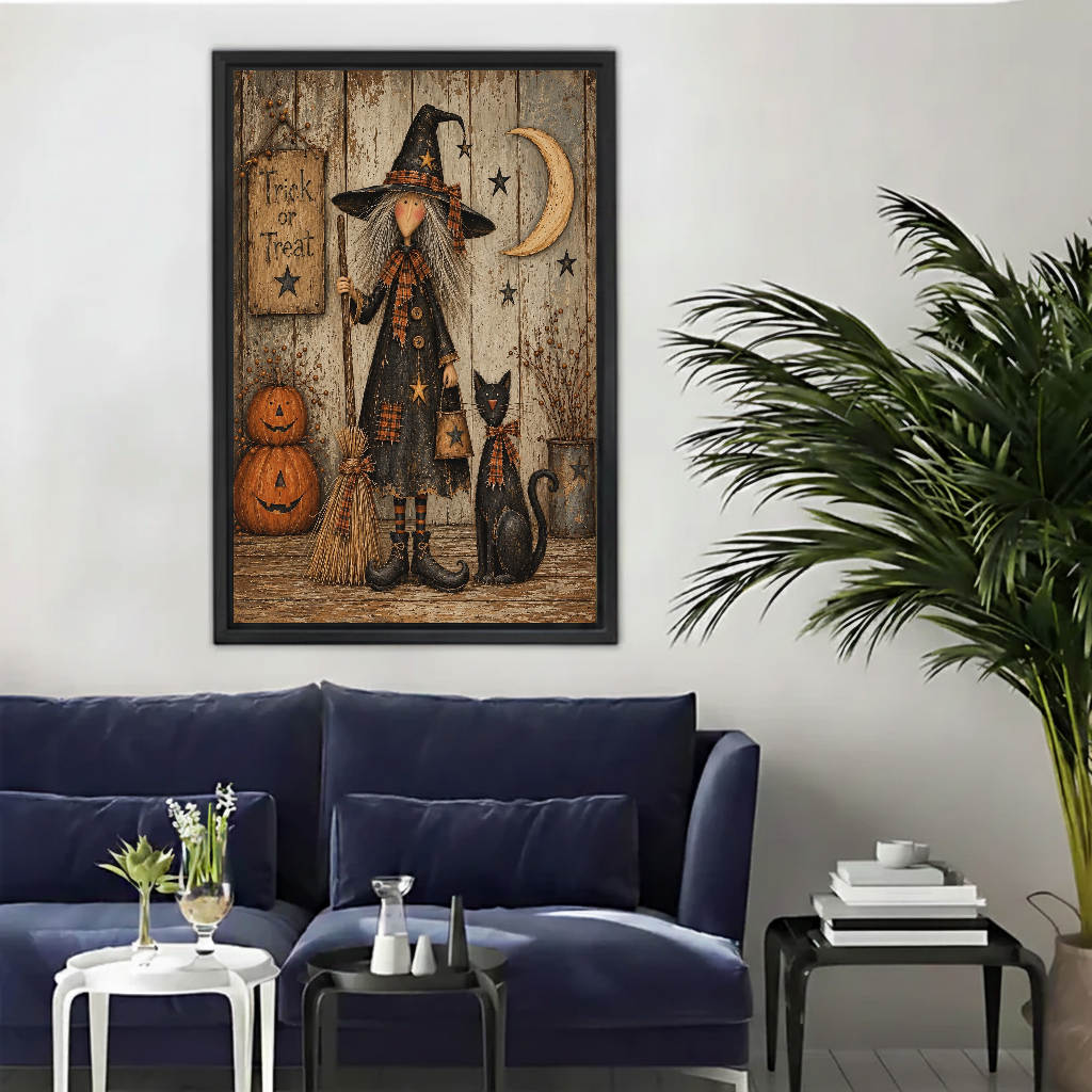 Vintage witch cat canvas wall art framed above a navy sofa beside a tall indoor palm.