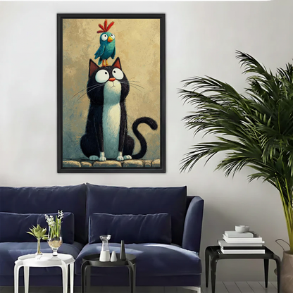 Whimsical cat owl canvas wall art framed above a navy sofa beside a tall indoor palm.