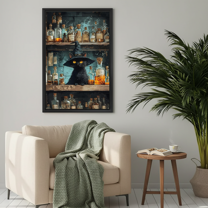 Vintage witch potion cat canvas wall art framed above a cream armchair with a green knitted blanket.