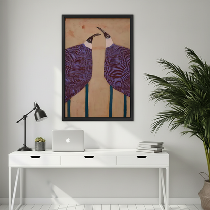 Graphic purple birds canvas wall art framed above a white desk with a laptop and black lamp.