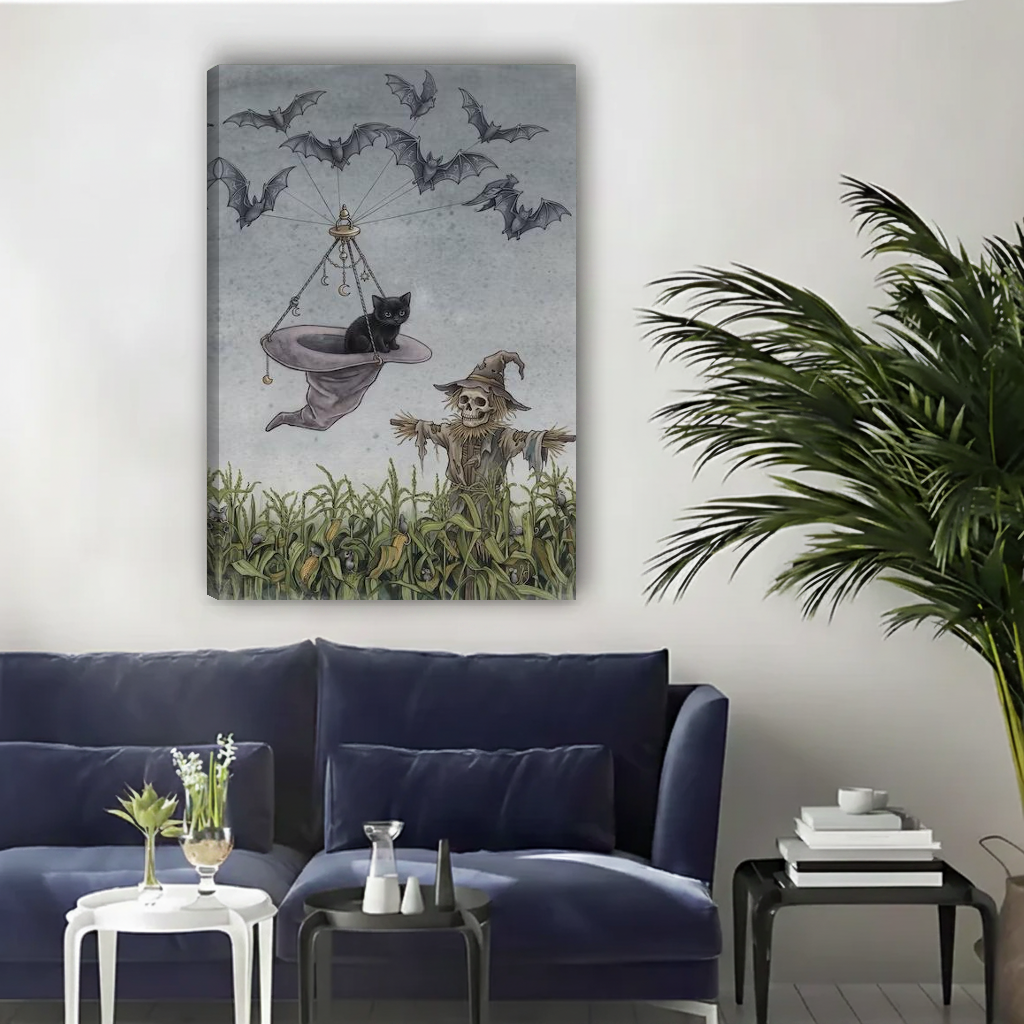 Whimsical flying cat canvas wall art unframed above a navy sofa in a bright living room.