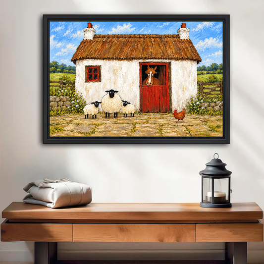 Rustic barn animals canvas wall art framed above a wooden console beside a lantern and folded blanket.