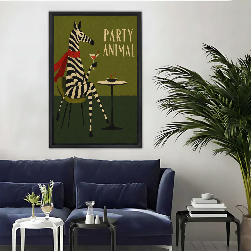 Retro party zebra canvas wall art framed above a navy sofa beside a tall indoor palm.