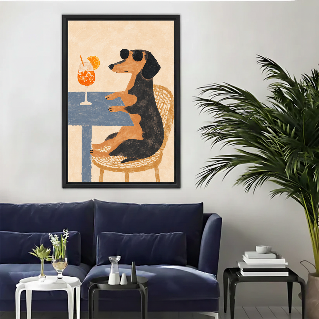 Funny sunglasses dachshund canvas wall art framed above a navy sofa beside a tall indoor palm.