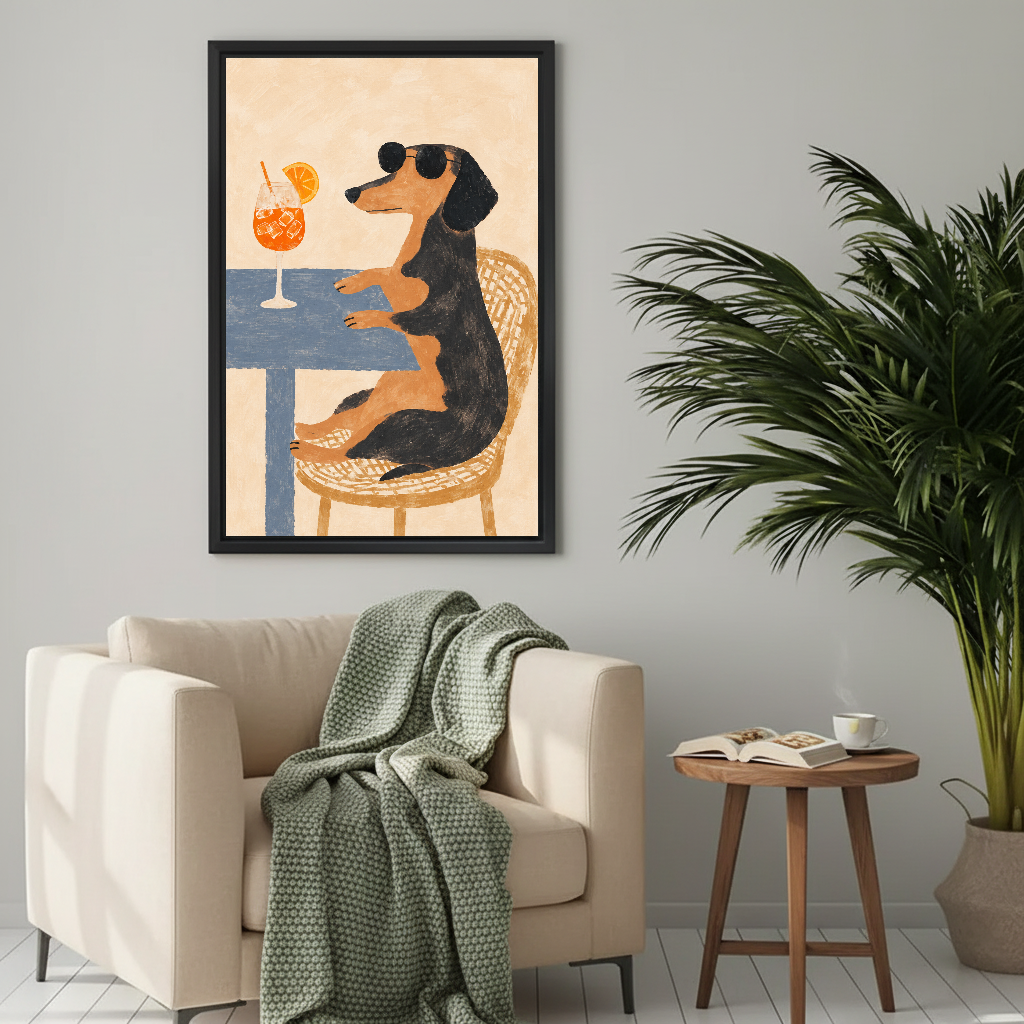 Funny sunglasses dachshund canvas wall art framed above a cream armchair with a green knitted blanket.