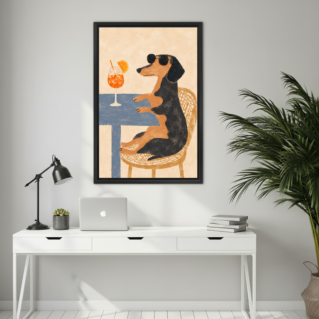 Funny sunglasses dachshund canvas wall art framed above a white desk with a laptop and black lamp.