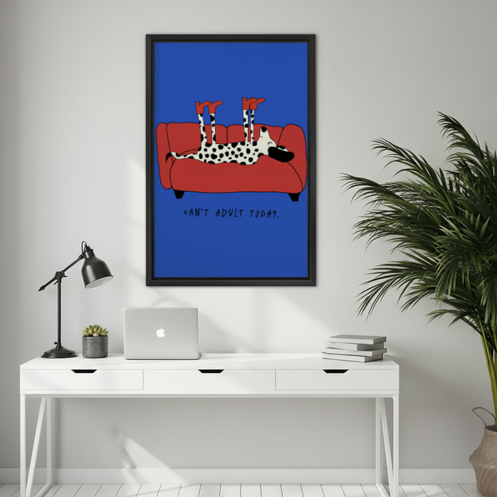 Lazy dog sofa canvas wall art framed above a white desk with a laptop and black lamp.