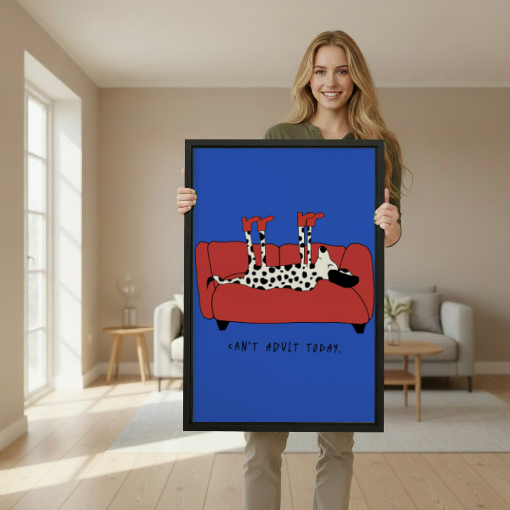Lazy dog sofa canvas wall art framed as a woman holds the artwork in a softly lit room.