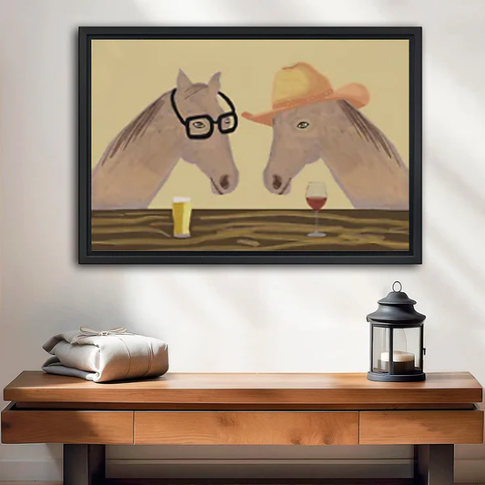 Whimsical horse wine canvas wall art framed above a wooden console beside a lantern and folded blanket.