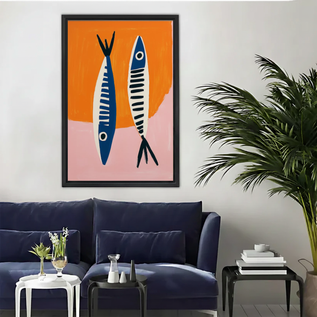Modern blue fish canvas wall art framed above a navy sofa beside a tall indoor palm.
