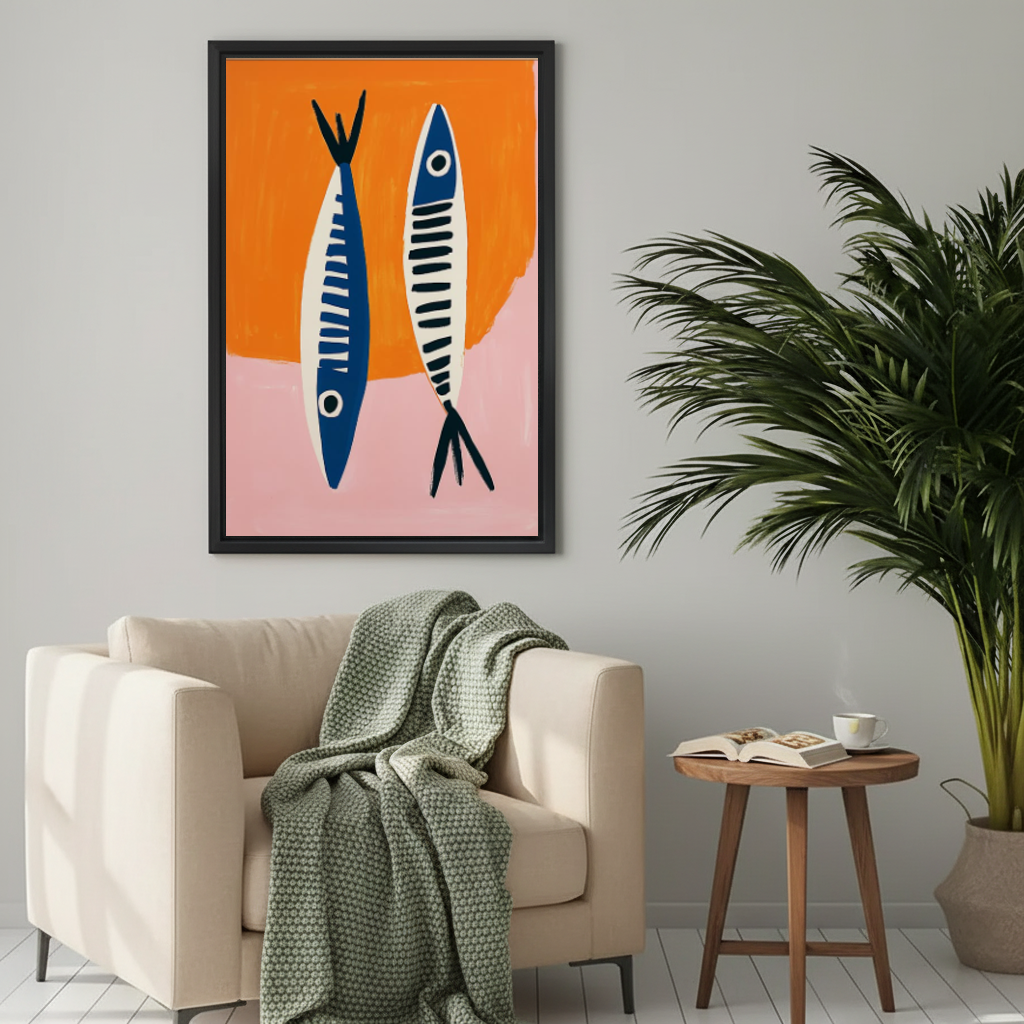 Modern blue fish canvas wall art framed above a cream armchair with a green knitted blanket.