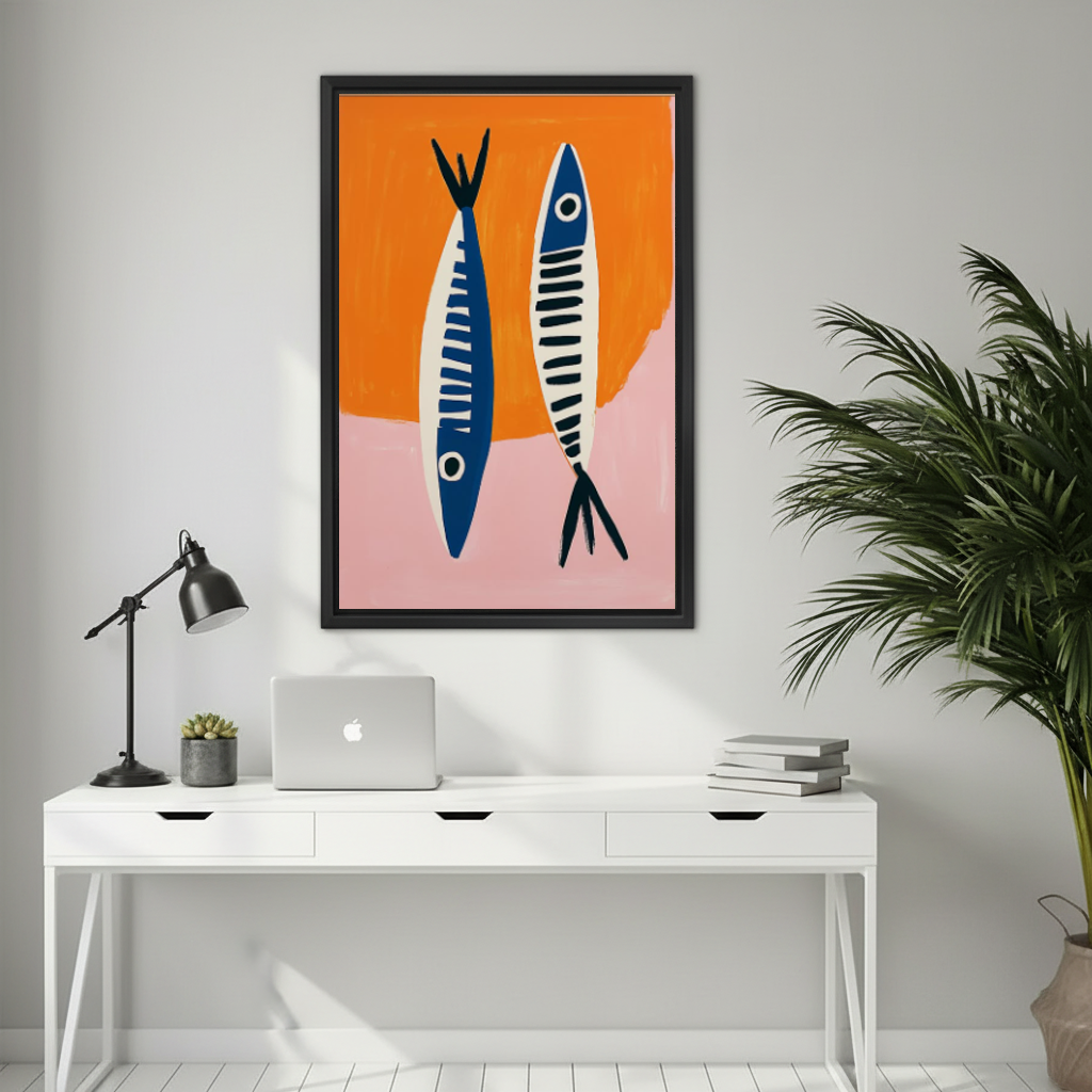 Modern blue fish canvas wall art framed above a white desk with a laptop and black lamp.