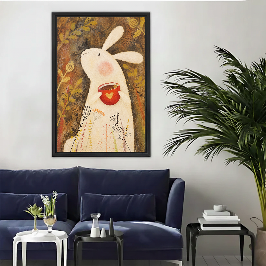 Gentle bunny heart canvas wall art framed above a navy sofa beside a tall indoor palm.