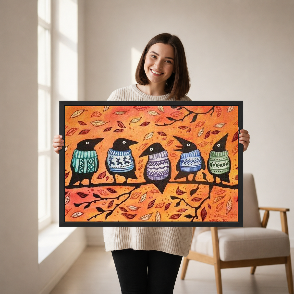 Autumn Sweater Crows canvas art framed, held by a woman in a neutral room.