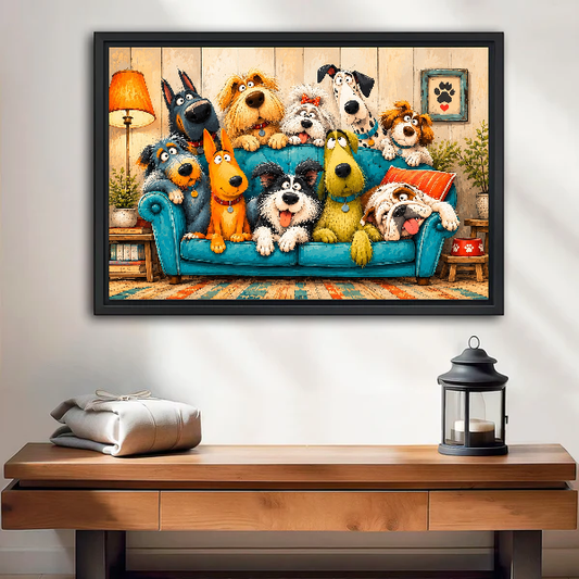 Whimsical dogs canvas wall art displayed in a black frame above a wooden table and lantern.