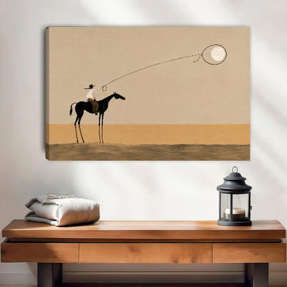 Surreal Cowboy Moon Lasso artwork as unframed canvas above a warm wooden table.