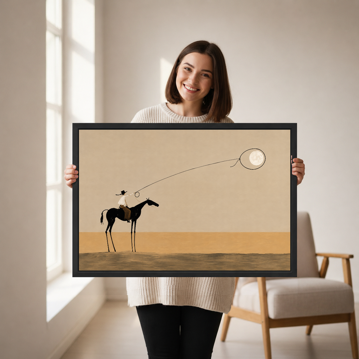 Surreal Cowboy Moon Lasso artwork held by a woman in a softly lit neutral living room.