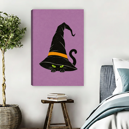 Whimsical Witch Hat Cat artwork as unframed canvas above a bed with blue bedding.