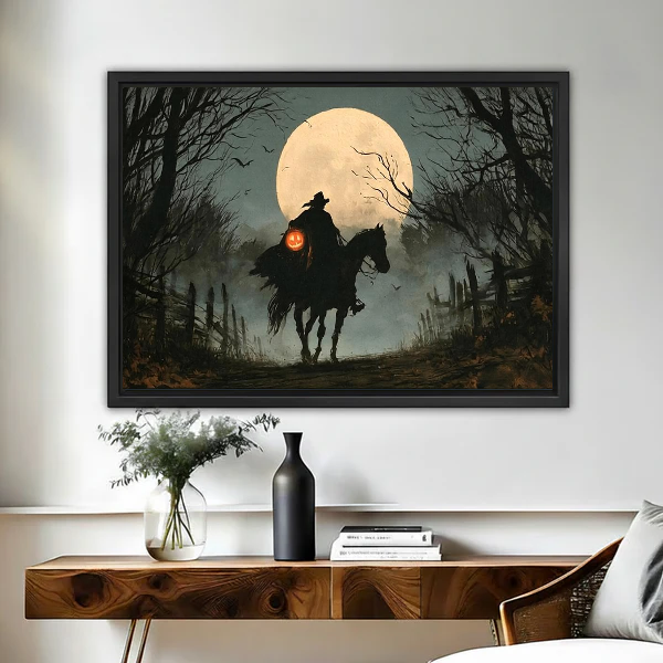 Gothic Moonlit Witch Rider artwork in a black frame above a live-edge wooden desk.