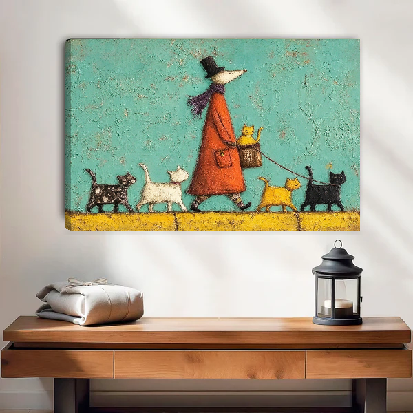 Whimsical cat walk canvas wall art shown as an unframed canvas above a warm wooden table.