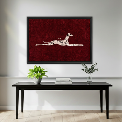 Surreal Dalmatian Cocktail artwork in a black frame above a black console with plants.