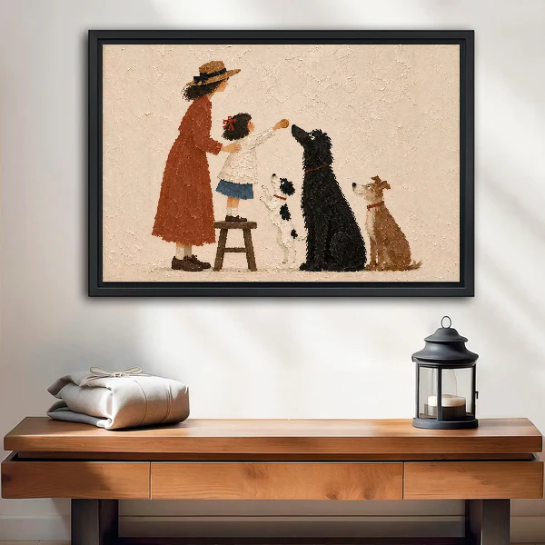 Mother Child Dogs artwork in a black frame above a wooden table and lantern.
