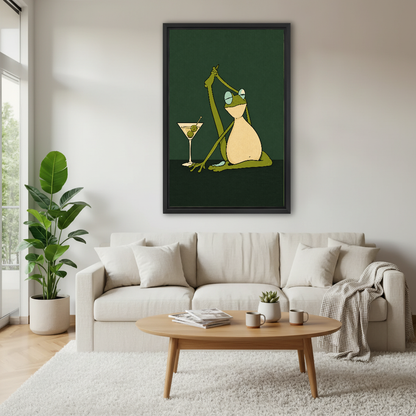 Funny Yoga Martini Frog artwork in a black frame above a cream sofa in daylight.