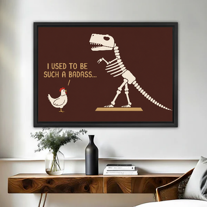 Funny Dinosaur Chicken artwork in a black frame above a live-edge wooden desk.