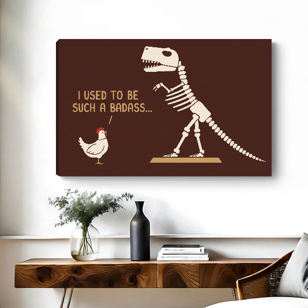 Funny Dinosaur Chicken artwork as unframed canvas above a wooden desk with black vase.