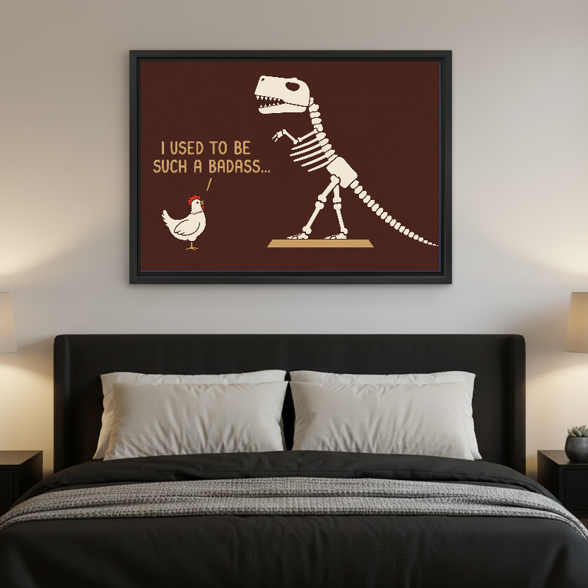 Funny Dinosaur Chicken artwork in a black frame above a bed with dark headboard.