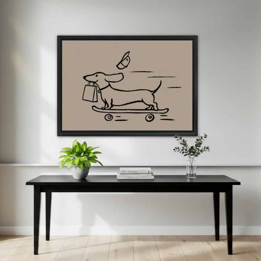 Funny Skateboard Dachshund artwork in a black frame above a black console with plants.