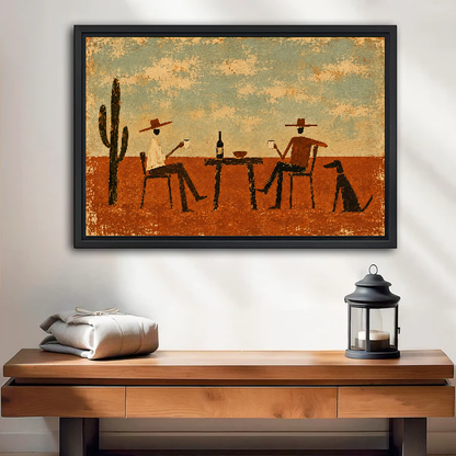 Rustic Cowboy Drinking Friends artwork in a black frame above a wooden table and lantern.