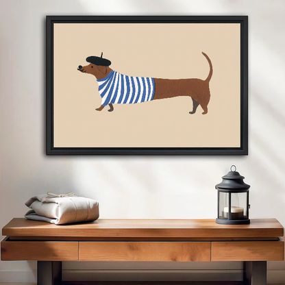French Striped Dachshund artwork in a black frame above a wooden table and lantern.