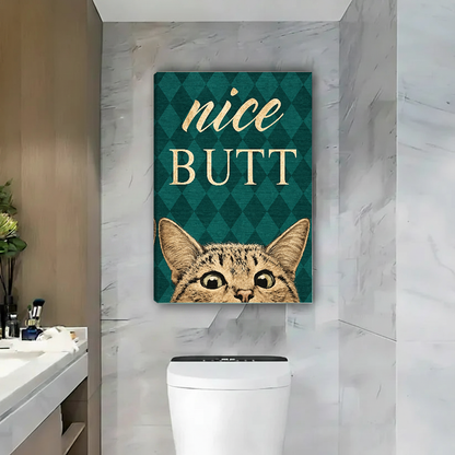 Nice Butt Bathroom Cat artwork as unframed canvas above a toilet on a marble wall.