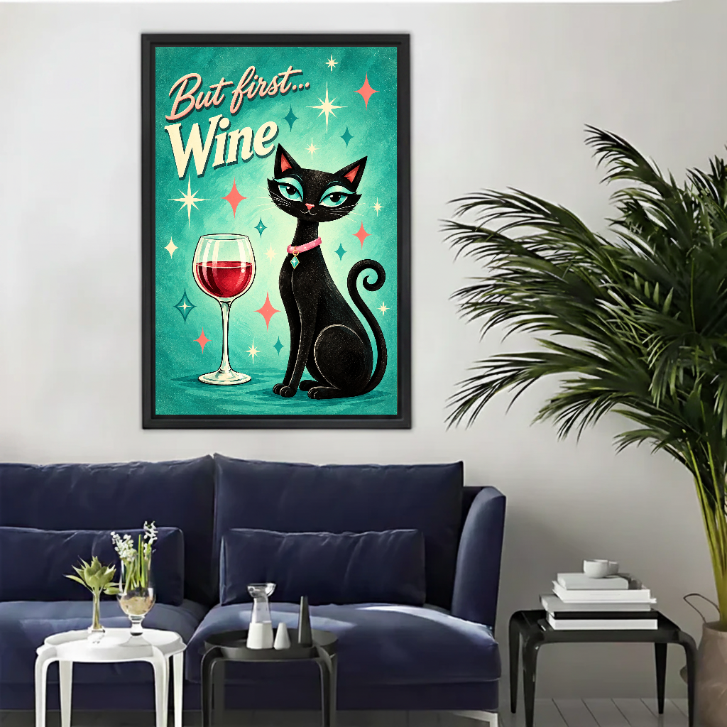 retro wine cat canvas wall art framed above a navy sofa beside an indoor palm.