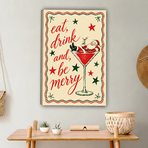 retro santa martini canvas wall art unframed above a light wood console with cacti and basket.