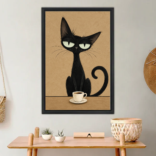 sleepy coffee cat canvas wall art framed above a light wood console with cacti and basket.