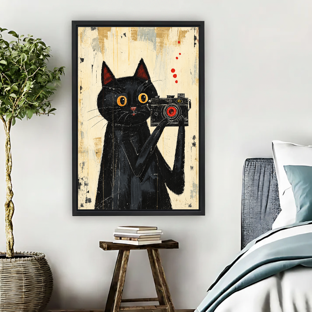 vintage camera cat canvas wall art framed beside a blue bed with books and a leafy plant.