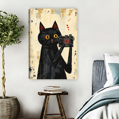 vintage camera cat canvas wall art unframed beside a blue bed with books and a leafy plant.