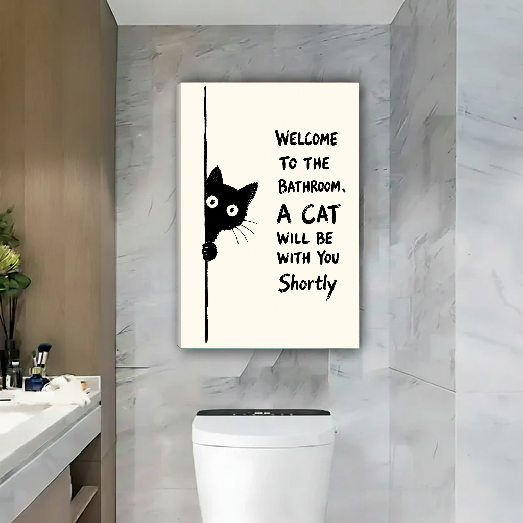 Funny Bathroom Cat Canvas Wall Art unframed above a toilet in a marble bathroom.