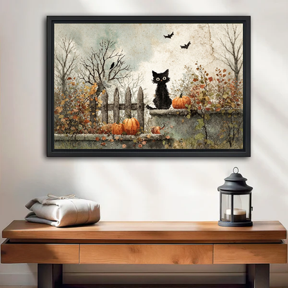 Autumn Garden Black Cat canvas art framed above a wooden table and lantern.
