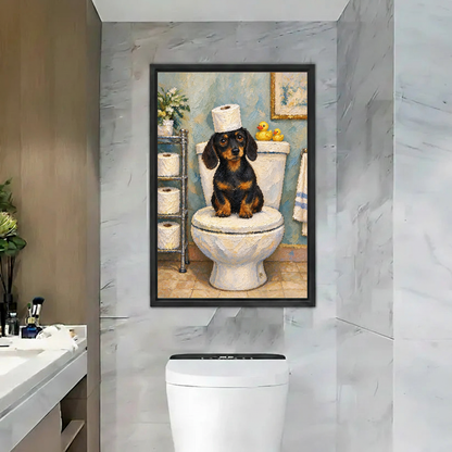 Funny Toilet Dachshund canvas art framed above a white toilet on a marble wall.