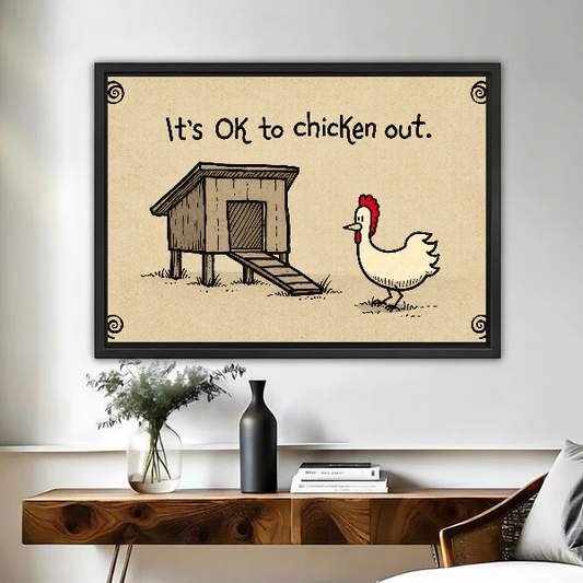 Chicken Out Funny Quote canvas art framed above a wooden desk with a dark vase.