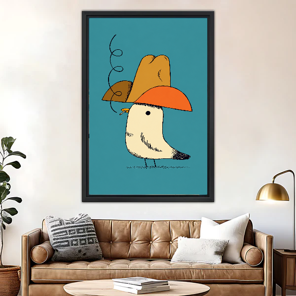 Cowboy Hat Smoking Seagull canvas art framed above a brown leather sofa and brass lamp.