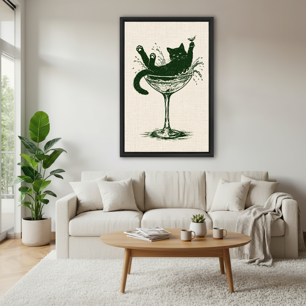 Martini Glass Lounging Cat canvas art framed above a cream sofa and pale wooden table.