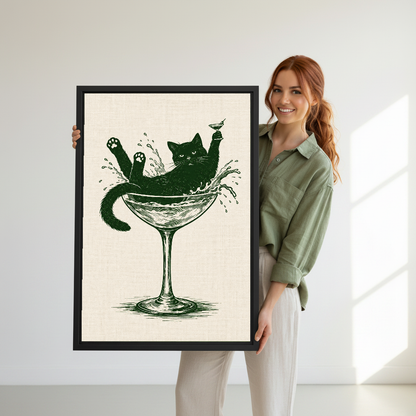 Martini Glass Lounging Cat canvas art held framed by a woman wearing sage green.